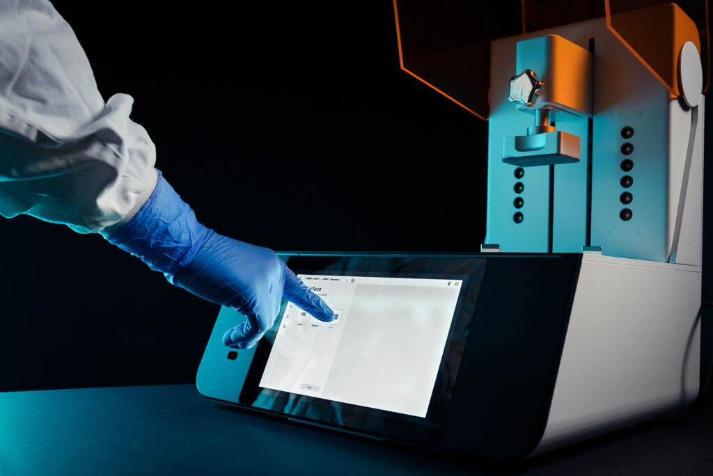 Person clicking on the LUMEN X touchscreen